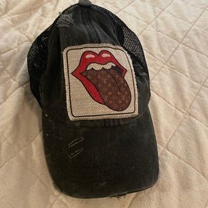 Hat with LV tongue patch